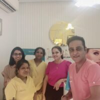 Dr Neethu George Dermatologist Kerala with GLOW Team